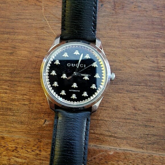 Gucci G timeless auto w/ black onyx dial